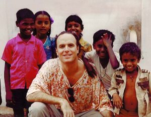 Dr. Weiss with children in India